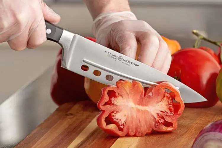 What Are the Functionalities of Holes in Knife Blades?
